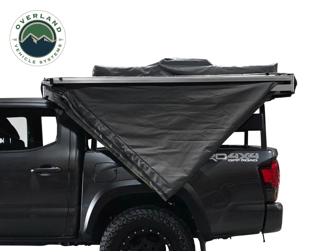 Overland Vehicle Systems Nomadic Awning 180 Dark Gray Cover With Black Transit Cover & Brackets