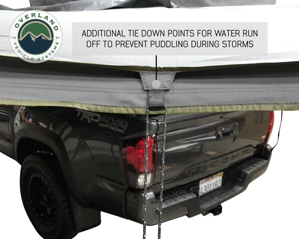 Overland Vehicle Systems Nomadic Awning 270 Dark Gray Cover With Black Transit Cover Driver Side & Brackets