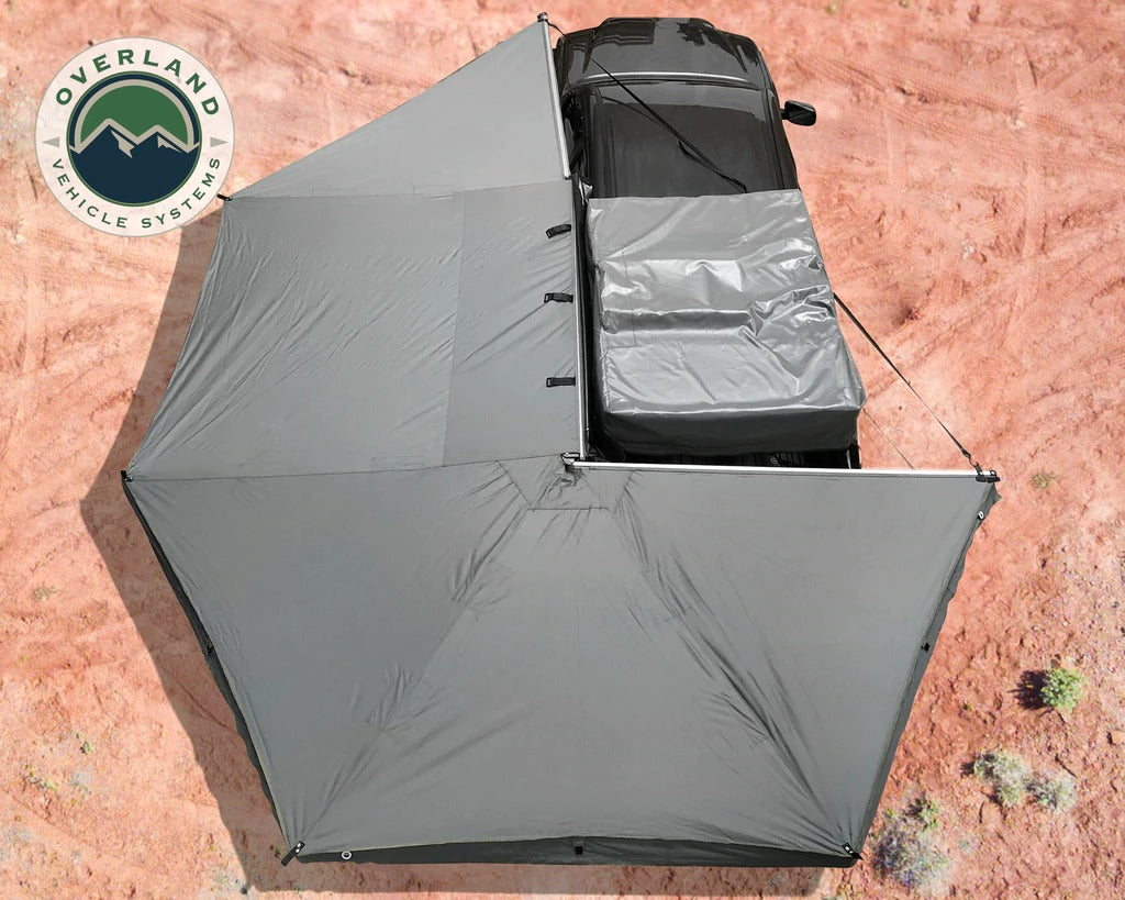 Overland Vehicle Systems Nomadic Awning 270 Dark Gray Cover With Black Transit Cover Driver Side & Brackets